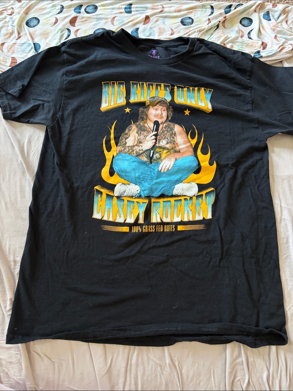 B64 Casey Rockett Graphic Tee - Black with Yellow & Blue Print